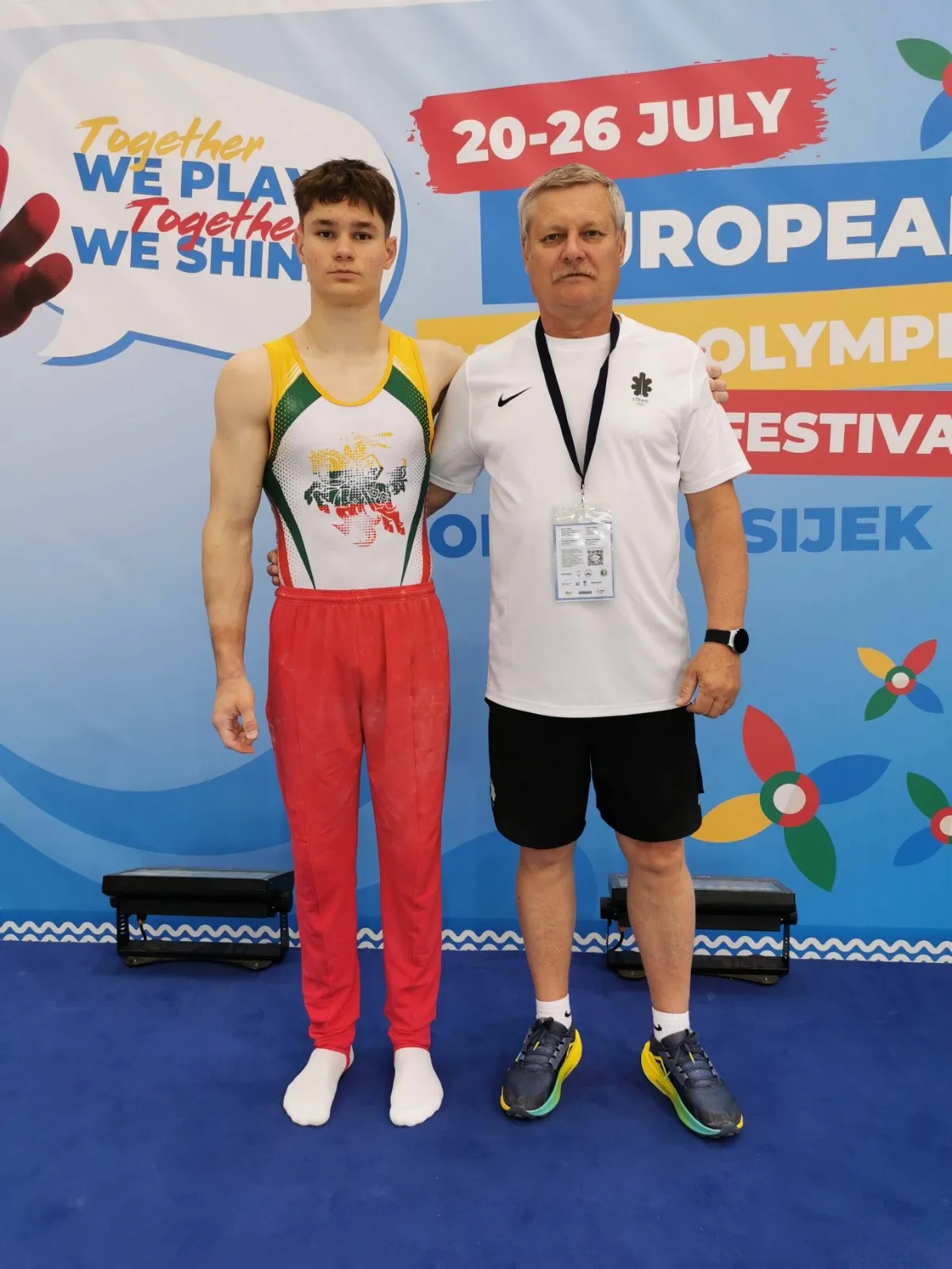 Gimnastas Alanas Kundreckas su treneriu