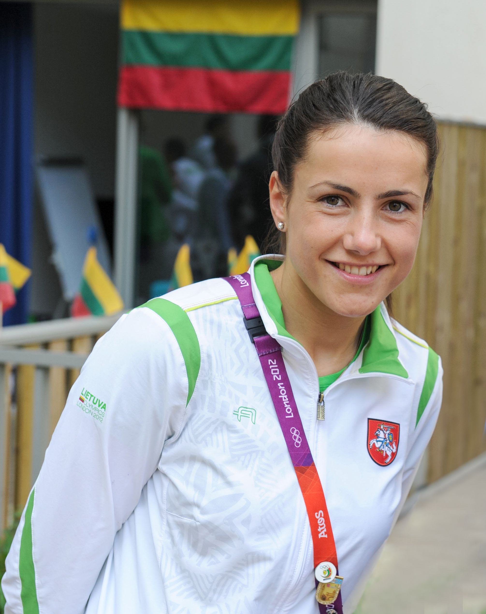 Olimpinėse žaidynėse žaidė du Lietuvos badmintonininkai: A.Stapušaitytė ir K.Navickas/Alfredo Pliadžio nuotr.